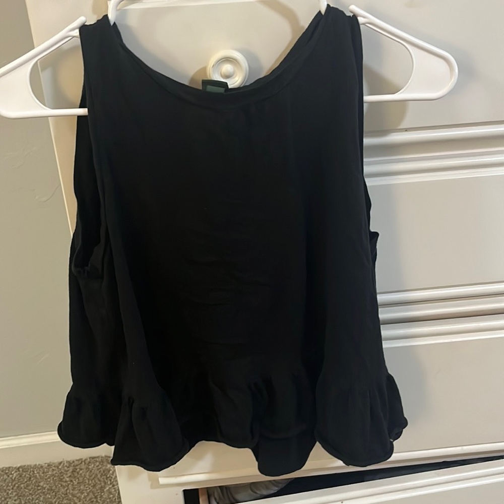 Black tank top with ruffles at the bottom no damage good as new